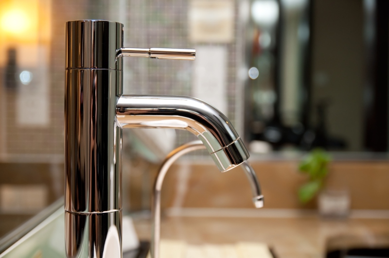 Leaking tap being repaired in West Wickham